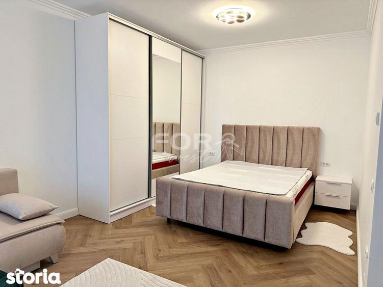 Apartament modern, cu parcare, de inchiriat in Sanmartin - 12
