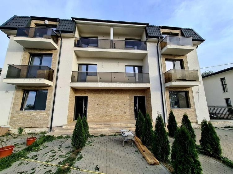 BUFTEA - APARTAMENT 3 CAMERE CU TRERASA SI CURTE.