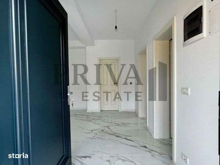 1/2 Duplex 124 mp utili + 330 curte. Dormitor parter,Bucatarie inchisa - 1