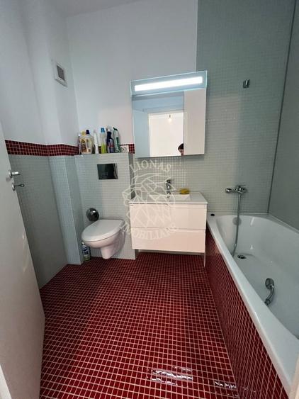 Apartament cu 2 camere semidecomandat, mobilat în Calea Moldovei