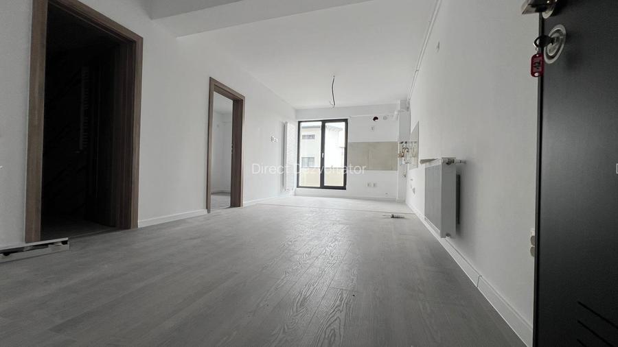 Studio cu dormitor separat – 38 mp utili, compartimentare eficientă
