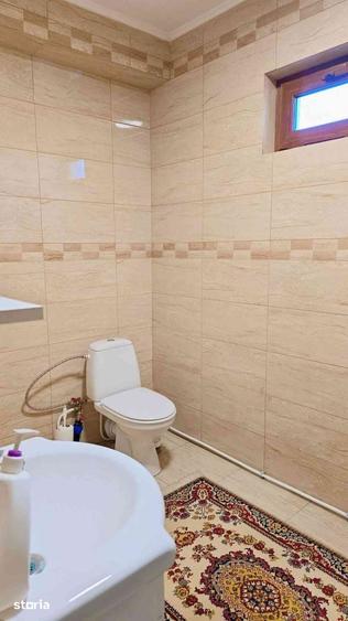 Casă cu 4 camere cu Teren 416.98 Mp în Olanu