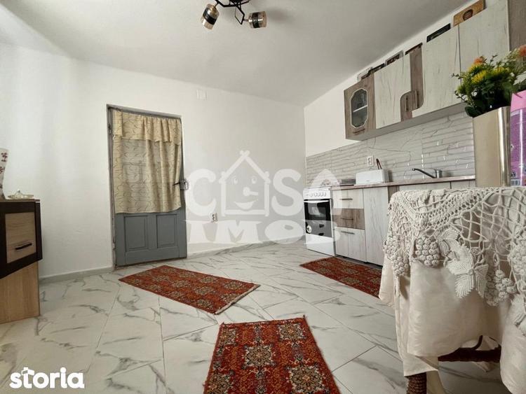 Casa parter + anexa renovata cu teren la strada - 12