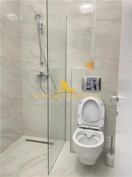 NOVISIMO-IMOBILIARE: APARTAMENT DE INCHIRIAT CU 3 CAM , DOUA BAI IN ZONA VEST - 9