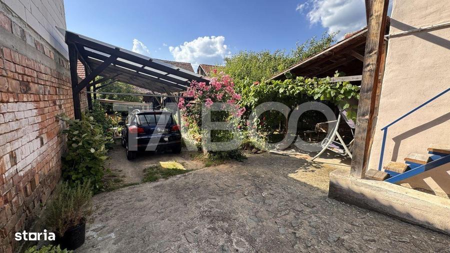 Casa de vanzare cu curte spatioasa loc relaxare si gradina Cornatel - 11