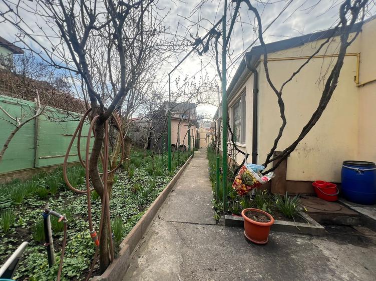 Casa  cocheta , la sol, caramida, teren 386 mp/desch. de 13 m,garaj, 299000 euro - 14