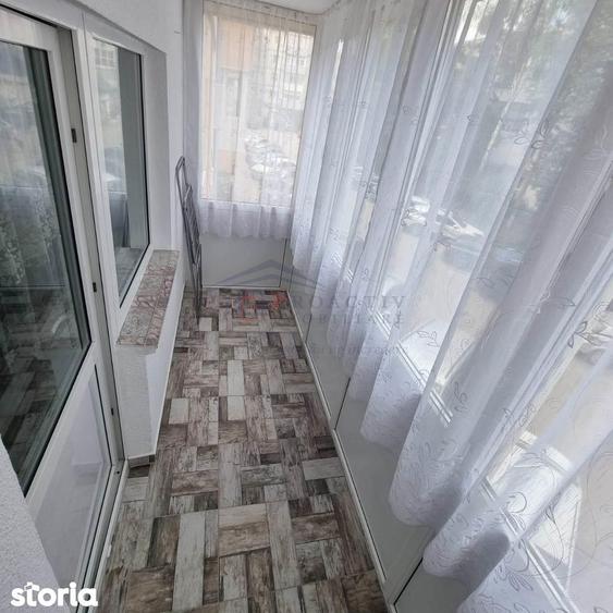 Apartament cu 2 camere semidecomandat, mobilat în Central