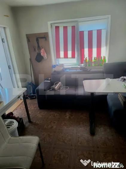 Casă cu 2 camere cu Teren 2000 Mp în Central