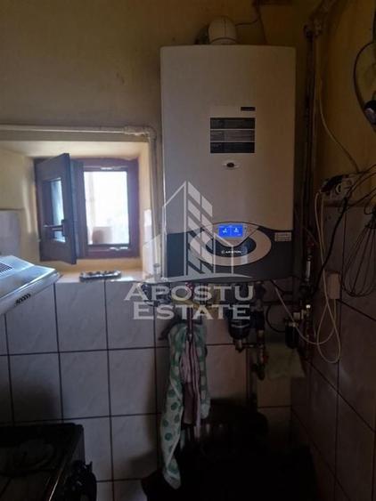 Casa familiala cu spatiu comercial si garaj P+1E+M 720 Mp - 21