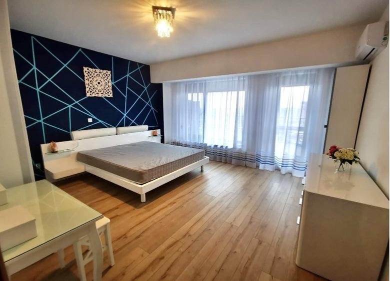 Apartament cu 2 camere decomandat, mobilat în Bucureștii Noi — fotografia 2