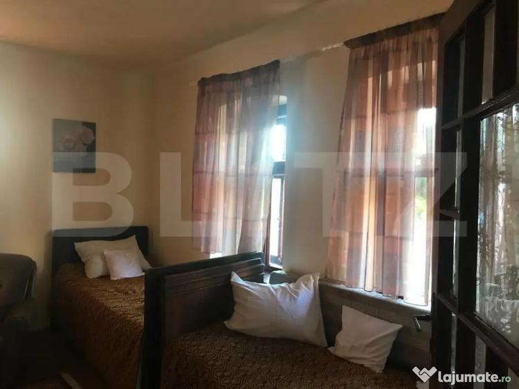 Casa individuala cu doua camere,60 mp utili, 500 mp teren, C - 10