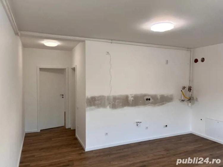 Ap de vanzare cu 2 camere ?i gradina nou finisat in Flore?ti zona Tau?iului parcare - 4