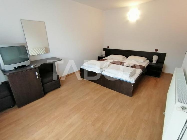 Pensiune 13 camere 16 bai sauna piscina si teren 1565 mp Cisnadioara - 28