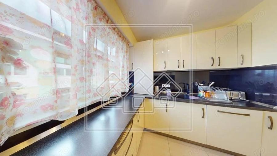 Ap.cu 3 camere, 2 bai si balcon, etaj intermediar, mobilat si utilat - 7