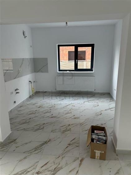 Duplex spatios - bucatarie inchisa - zona linistita - teren 375 mp - 12