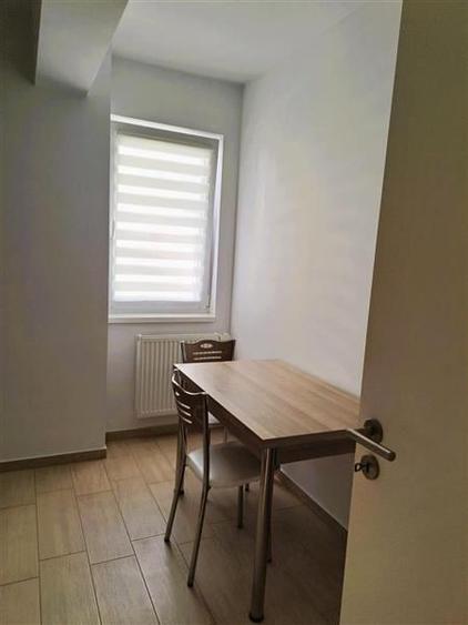Apartament 2 camere, etaj 2, mobilat si utilat . Zona Tractorul - 12