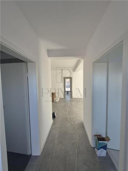 Duplex pe parter - zona linistita - toate utilitatile - compartimentare excelent - 2