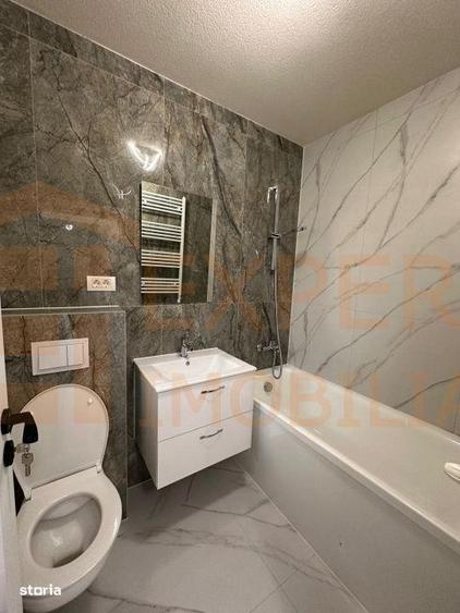 Visezi o casa moderna - KM 5, 3 camere, teren 192 mp si parcare - 19