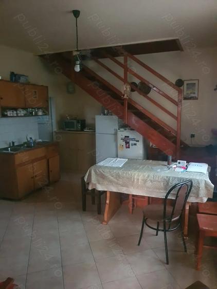 Casă cu Teren 1000 Mp în Central