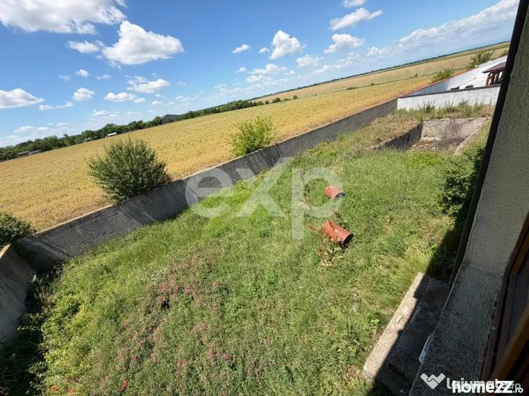 Casă cu 7 camere cu Teren 1000 Mp în Butimanu