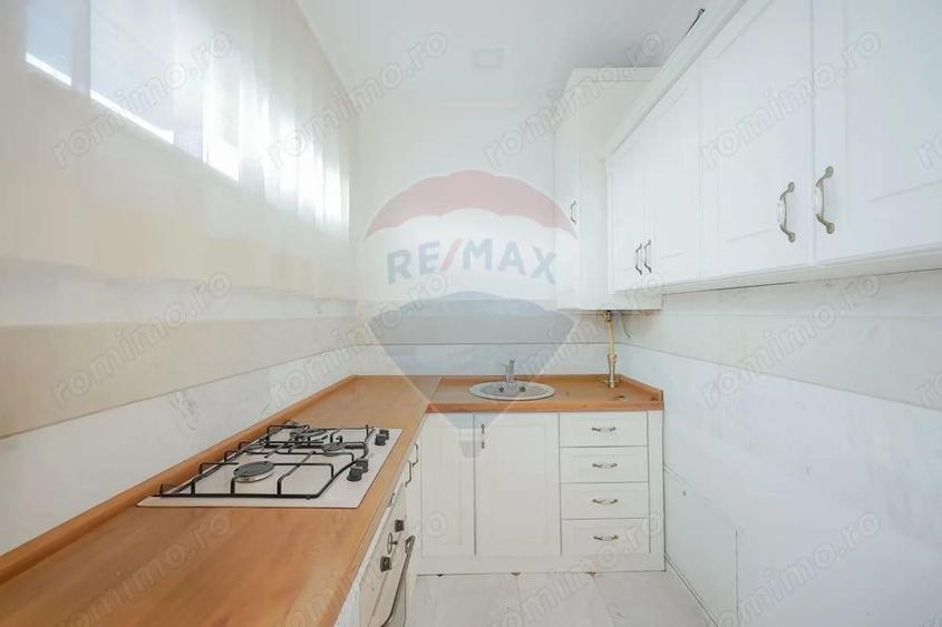 Cladire multifunc?ionala de vanzare spa?iu comercial + 2 apartamente - 2