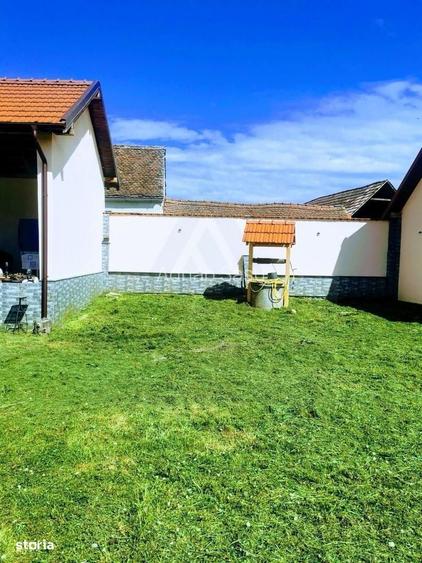 Casa individuala cu garaj 60 mp si teren+gradina 2650 mp in Porumbacu