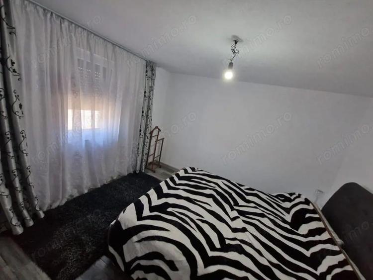 Casa de vanzare Baile?ti 100 mp, curte proprie - 10
