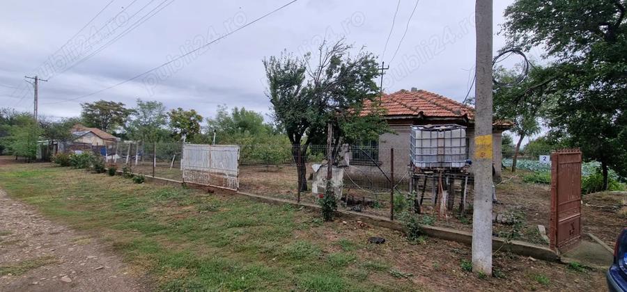 Casa de vanzare cu teren . - 2
