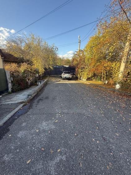 2 corpuri de Casă renovate + teren 125 mp Campina - 31