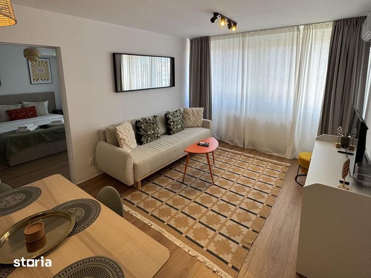 Apartament cu 2 camere semidecomandat, mobilat în Universitate
