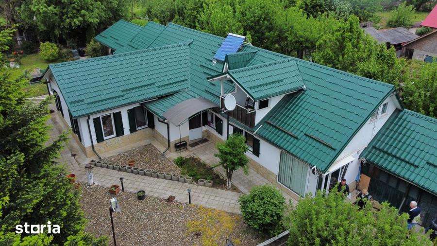 Casă cu 8 camere cu Teren 1000 Mp în Gârleni
