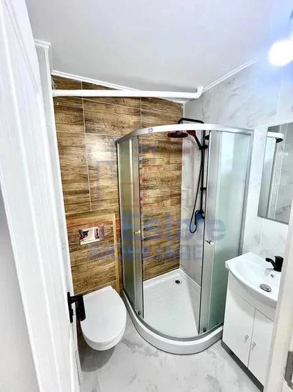 Apartament cu 4 camere decomandat în Filiași