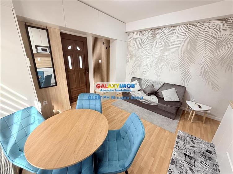 Apartament cu 2 camere semidecomandat, mobilat în Central