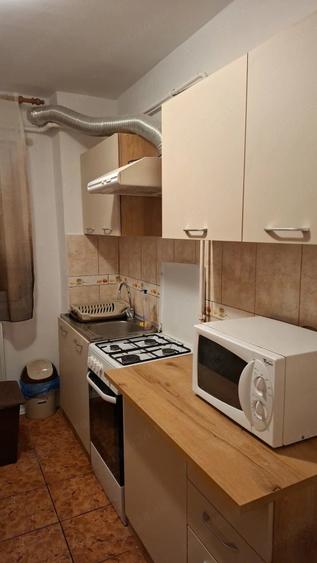 Agentie inchiriem apartament 2 camere Str. Henri Coanda V.Rosie Stadion,etaj.1 mobilat ,Centrala,AC - 9