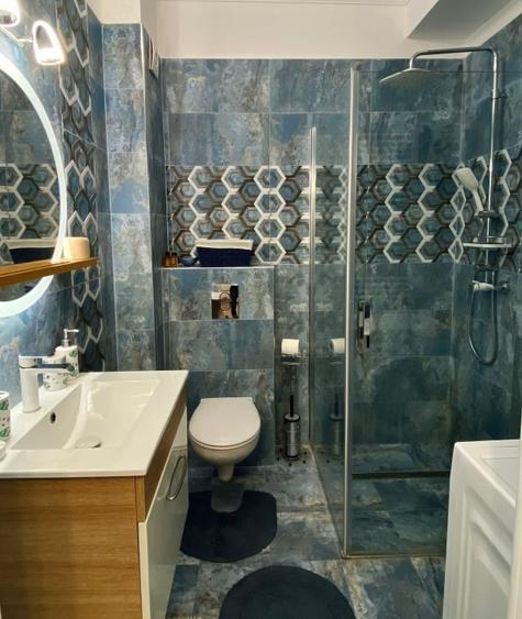 Apartament cu 2 camere semidecomandat, mobilat în Central