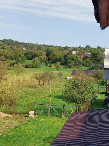 Casă cu 6 camere în Băiuț