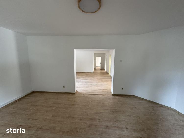 Casă cu 4 camere cu Teren 1000 Mp în Holboca