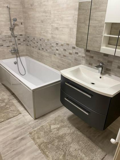 Apartament cu 3 camere semidecomandat, mobilat în 9 Mai