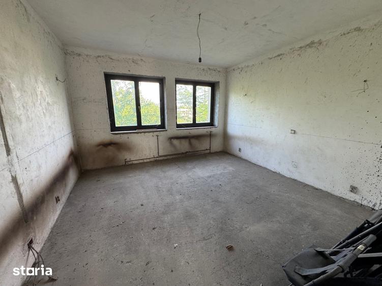Casă cu Teren 970 Mp în Brănești