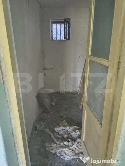 Casă cu 2 camere cu Teren 1200 Mp în Nord
