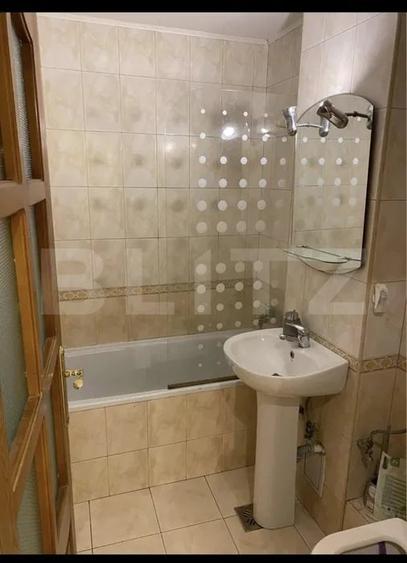 Apartament cu 2 camere semidecomandat, mobilat în Central