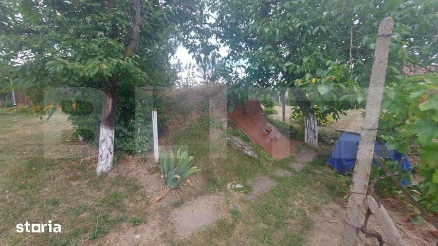Casă cu 2 camere cu Teren 1800 Mp în Central
