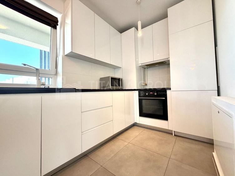 Apartament cu 2 camere semidecomandat, mobilat în Tractorul