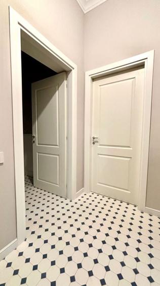 Apartament cu 4 camere în Romană