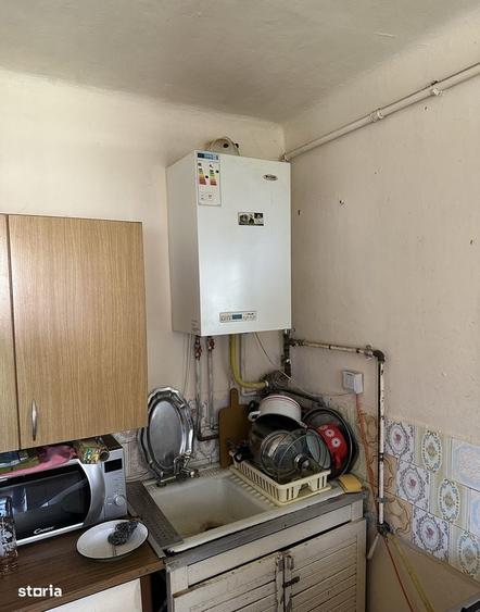 Casă cu 2 camere cu Teren 1000 Mp în Cojocna