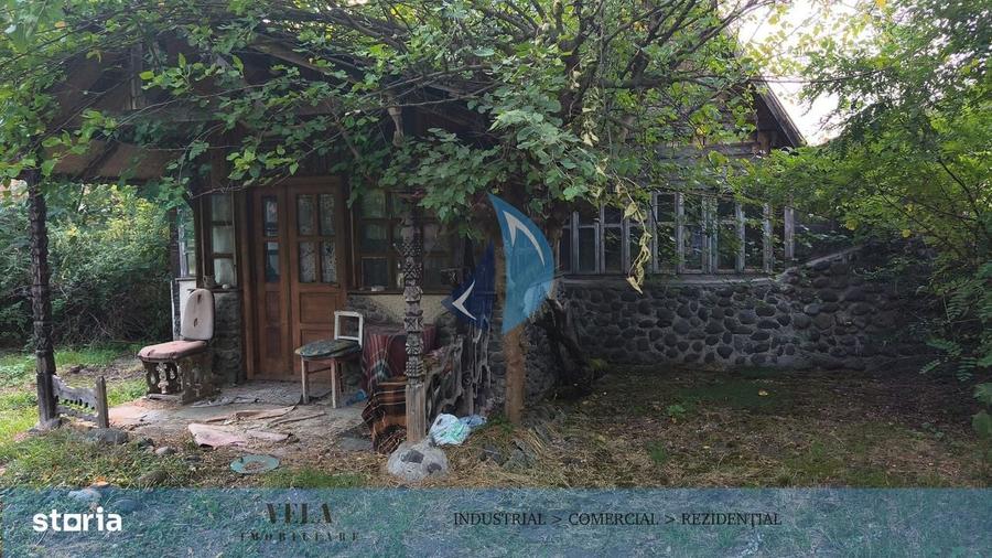 Casa din piatra si lemn in Dumbravioara cu teren intravilan 1.600 mp - 1