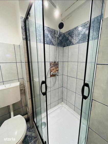 Apartament cu 3 camere decomandat în Tractorul