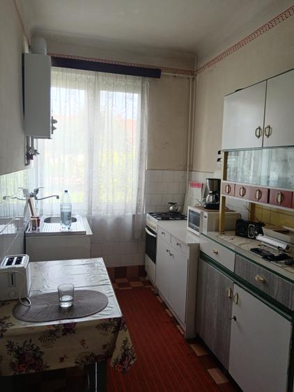 Casă cu 2 camere cu Garaj în Central