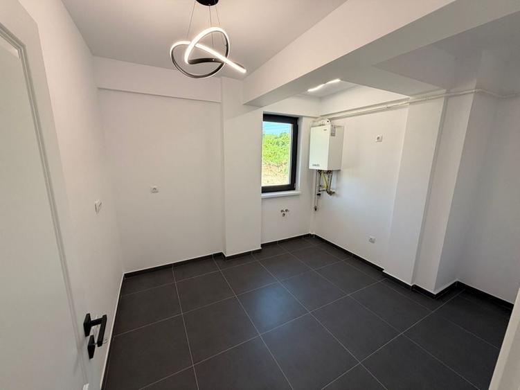 Apartament cu 3 camere decomandat în Bucium