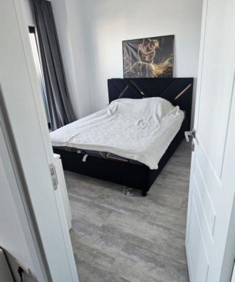 Apartament cu 2 camere decomandat în Km 5
